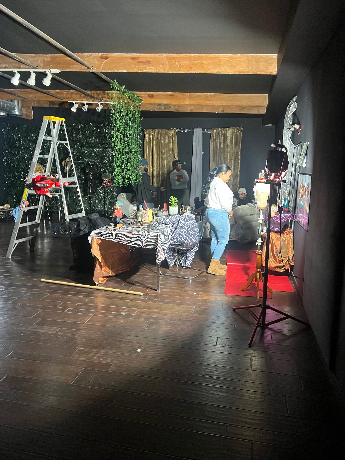 Wide shot of the Dogbelly set arranged like a museum room.